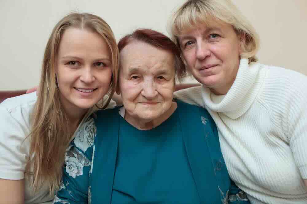 Two younger women and one elderly woman who’ve benefitted from hospice respite care.